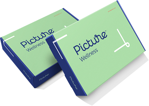 Two Picture Wellness green DNA test kit boxes